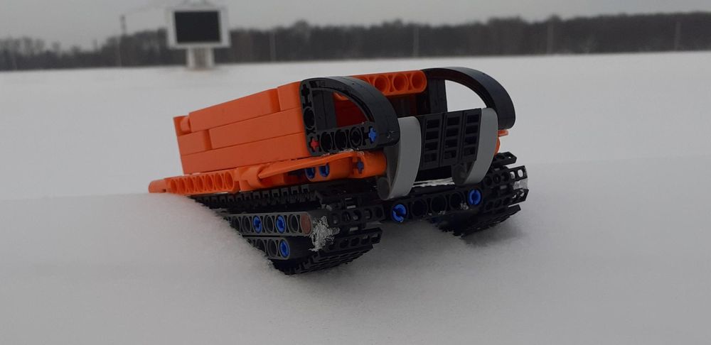Lego technic orange tracked all-terrain vehicle