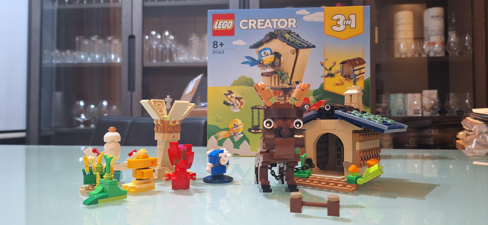 Doghouse with dog and plants