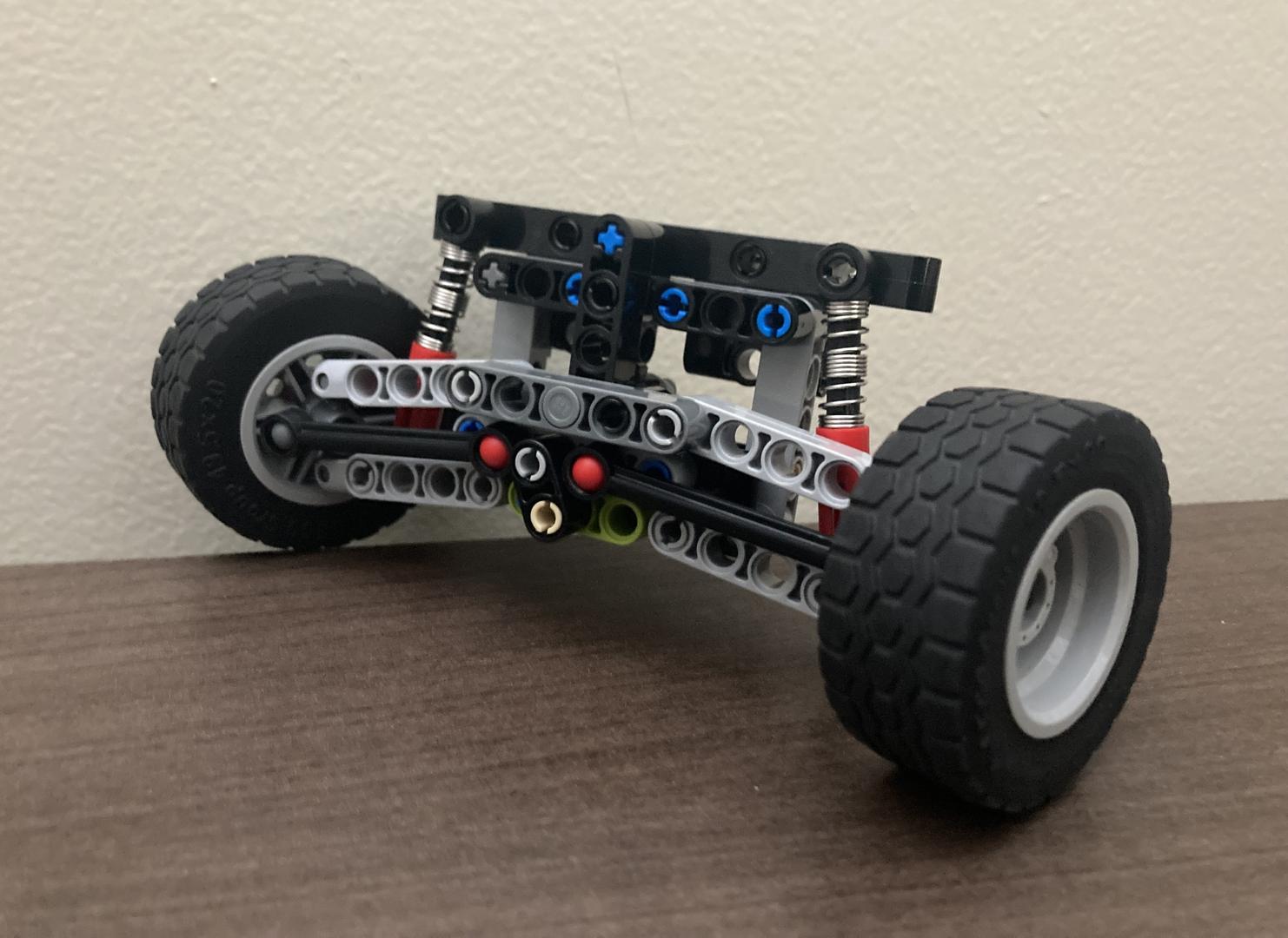 Compact steering with suspension