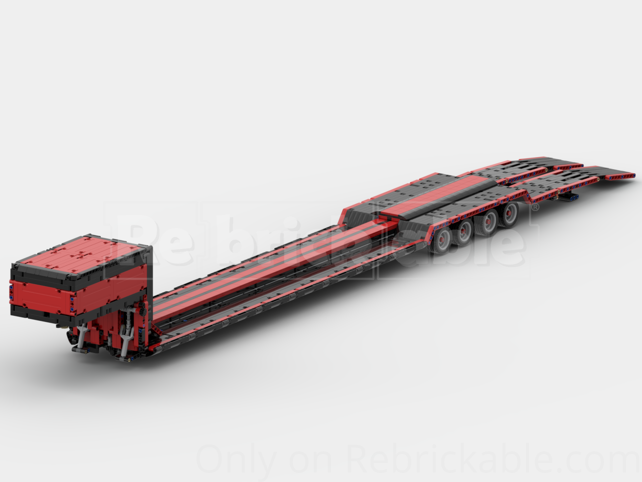 Lowboy trailer with motorized ramps and mechanical steering