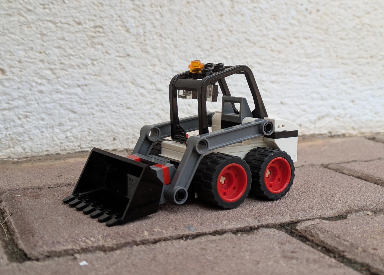 White Skid Steer Loader