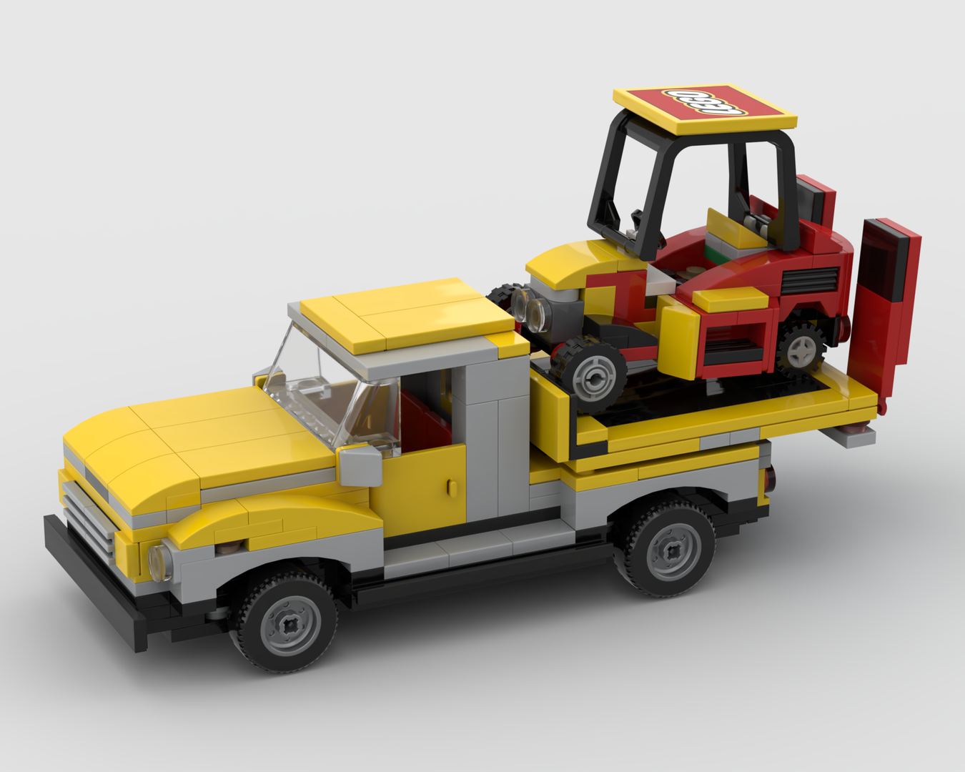 Flatbed pickup truck and mower