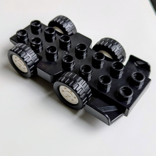 Duplo Car Base 2 x 8 with Front Spoilers, White Hubs