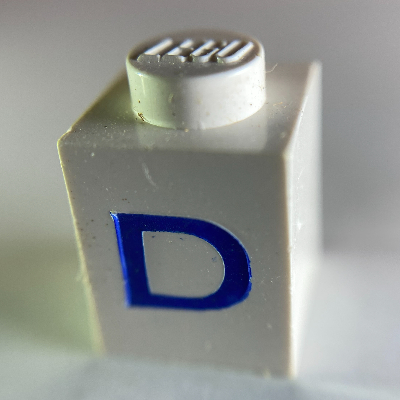 LEGO part Brick 1 x 1 with Blue 'D' Print (Serif Font)
