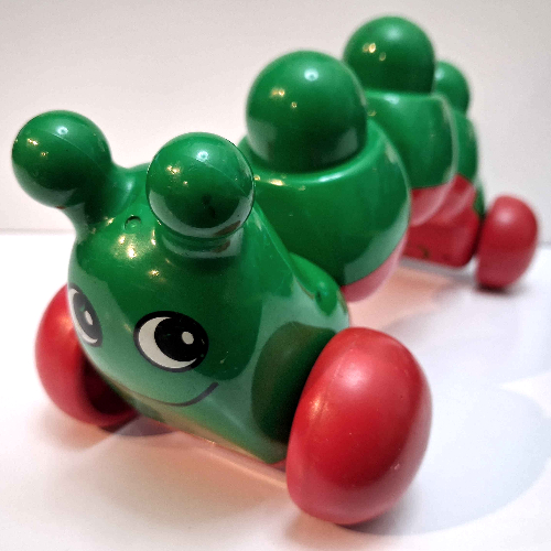 Primo Caterpillar with Red Wheels, Face print