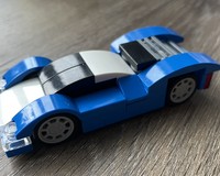 blue hybrid racing car