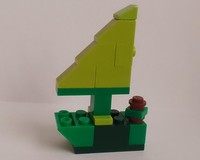 Green Boat with Sailor