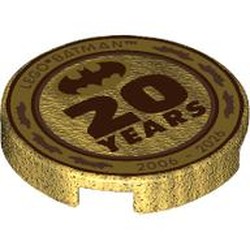 LEGO part 14769pr0029 Tile Round 2 x 2 with 'LEGO BATMAN', '20 YEARS', '2006-2026' and Batman Symbol Print in Warm Gold/ Pearl Gold
