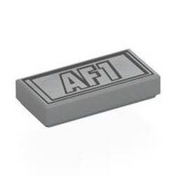 LEGO part 3069bpr0316 Tile 1 x 2 with Black 'AF1' in Rectangle print in Medium Stone Grey/ Light Bluish Gray