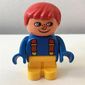 Duplo Figure, Early with Joined Legs Yellow, Blue Top with Red Suspenders, Red Hair, Freckles, White in Eyes Print