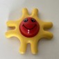 Primo Teether, 8 Arms, with Red Center and Smiling Face Print