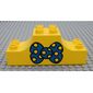 Duplo Brick 2 x 6 x 2 with Curved Ends and Bow Tie Print
