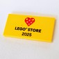 Tile 2 x 4 with 'Heart LEGO STORE 2025' print