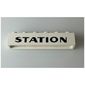 Brick 1 x 6 without Bottom Tubes with Cross Side Supports with 'STATION' print