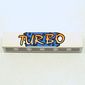 Brick 1 x 6 with Yellow 'TURBO' on Blue Background and Black Spots Print