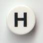 Tile Round 1 x 1 with Black 'H' print