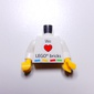 Torso with 'We Heart LEGO bricks' / LEGO Logo, 'KLADNO LEGO Production s.r.o.' Print, White Arms, Yellow Hands