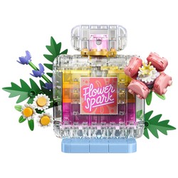 Flakon perfum z kwiatową ozdobą