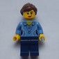 Woman, Medium Blue Polo Shirt with Necklace, Dark Blue Legs, Reddish Brown Ponytail
