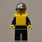 Fireman, Black Fire Jacket with Reflective Stripes, Radio, and Badge, Silver Helmet, Yellow Life Vest 2610, Beard and Glasses
