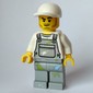 Man, Light Bluish Gray Overalls with Paint Stains, White Cap, Stubble