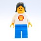 Woman, White Torso with Shell Logo, Blue Legs, Black Hair