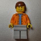 Man, Open Orange Jacket over Light Blue Shirt, Reddish Brown Hair